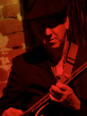 Andy Baylor on guitar with The Irwell Street String Band